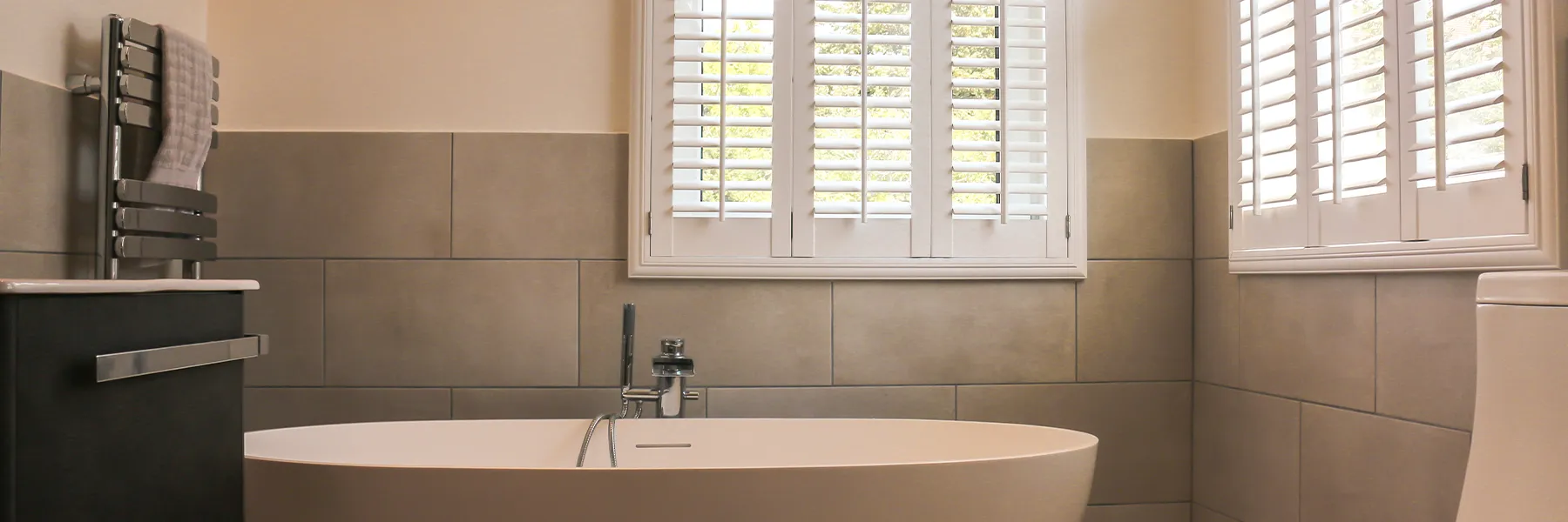 wood vs pvc shutters - center tilt bifold bathroom shutters