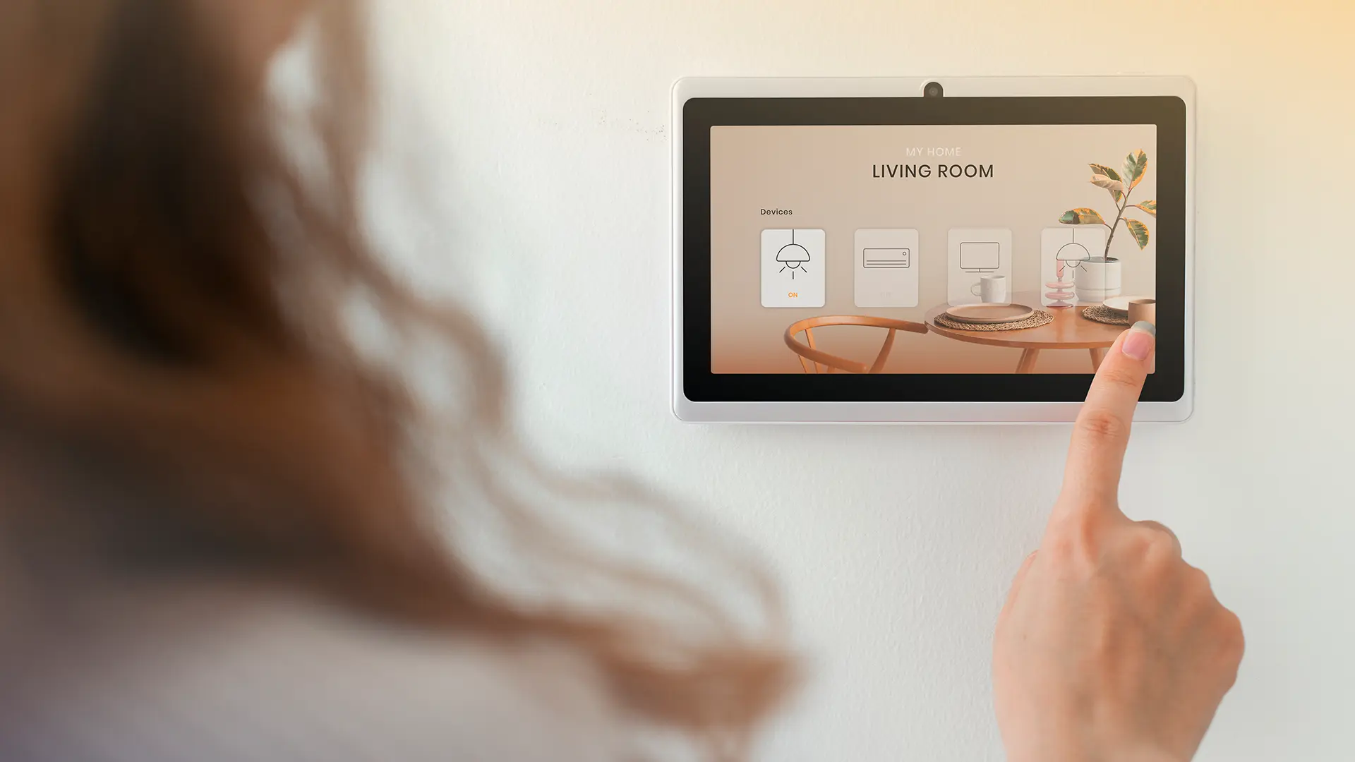 smart home woman using control panel