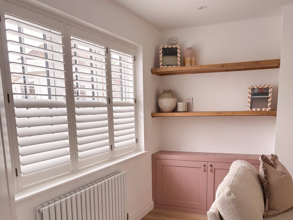 living room shutters with brass hinges