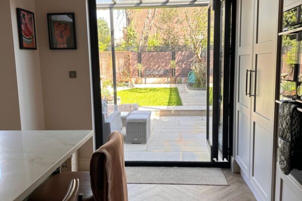 Pleated fly screen for bifold doors